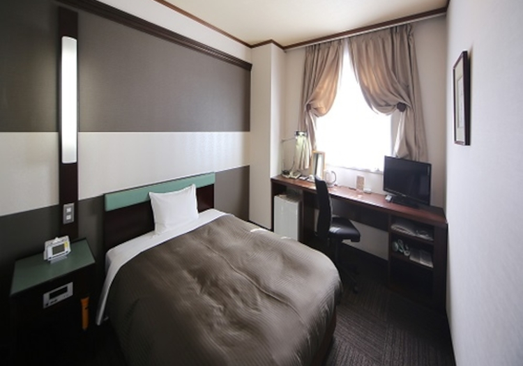 高級ベッドを採用した客室は、国宝・松本城を一望できるお部屋も。