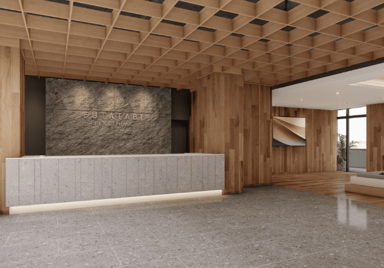 木の温もりと石の質感が調和するフロント。お客様の旅の始まりを彩る、ホテルの顔です