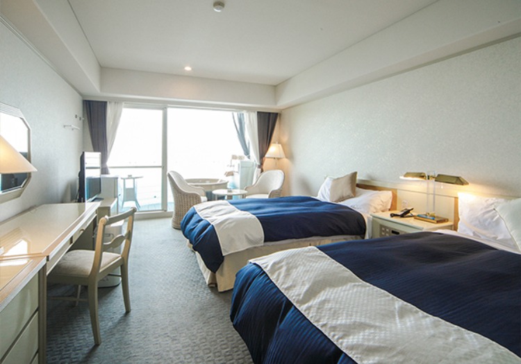 オーシャンビューを独り占めできる客室。洗練された空間で至高のおもてなしを。