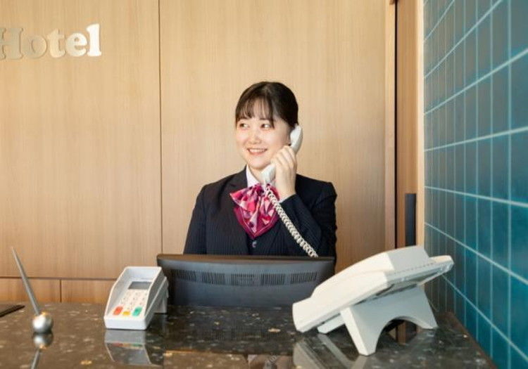 スマイルホテル大津瀬田 × フロント